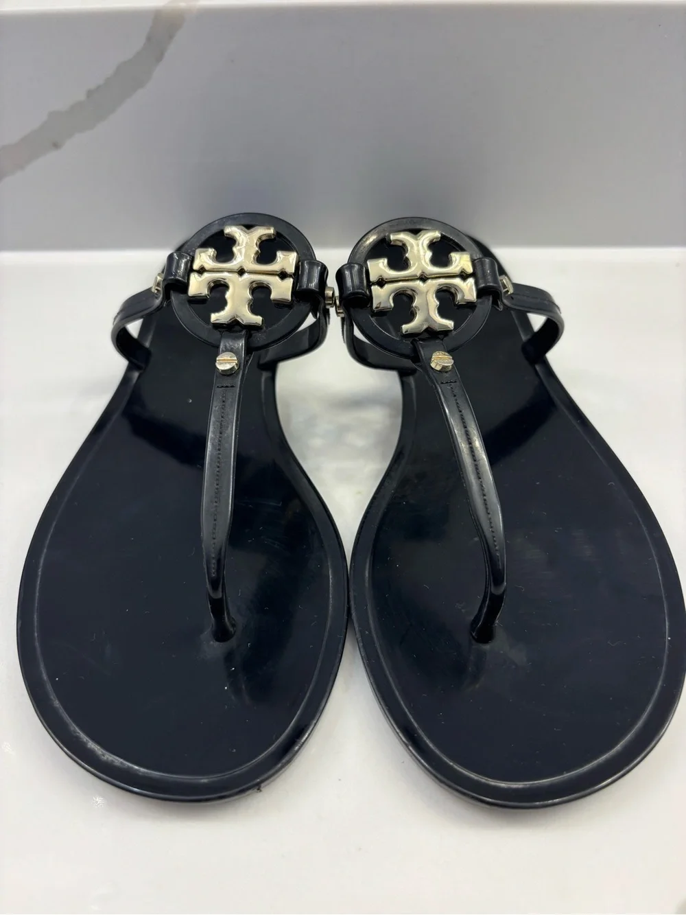 Tory Burch Black Jelly Thong Sandals with Gold Logo